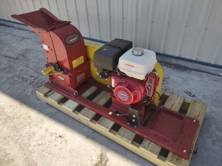 A red and yellow machine is on the ground