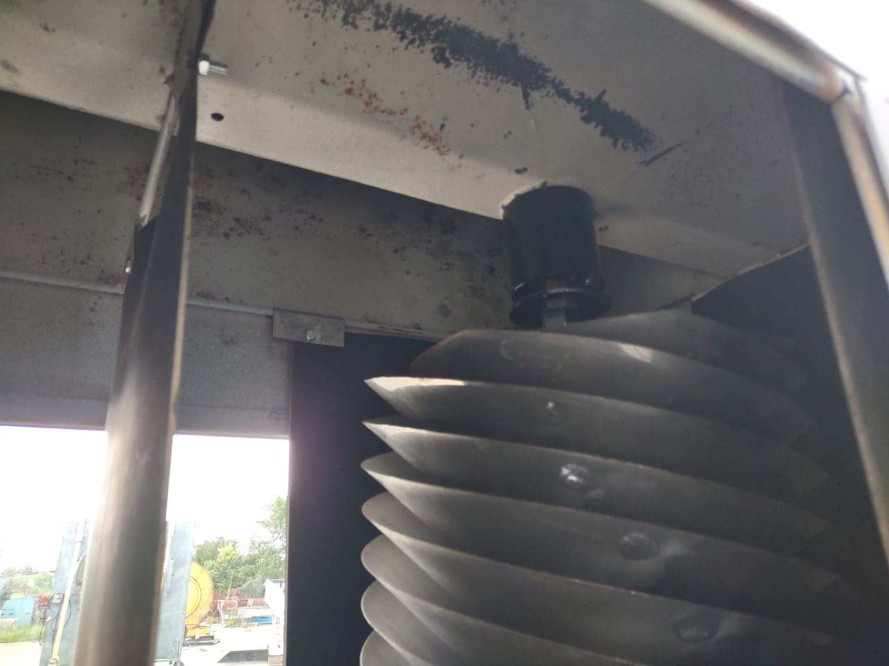 A close up of the inside of an industrial machine.