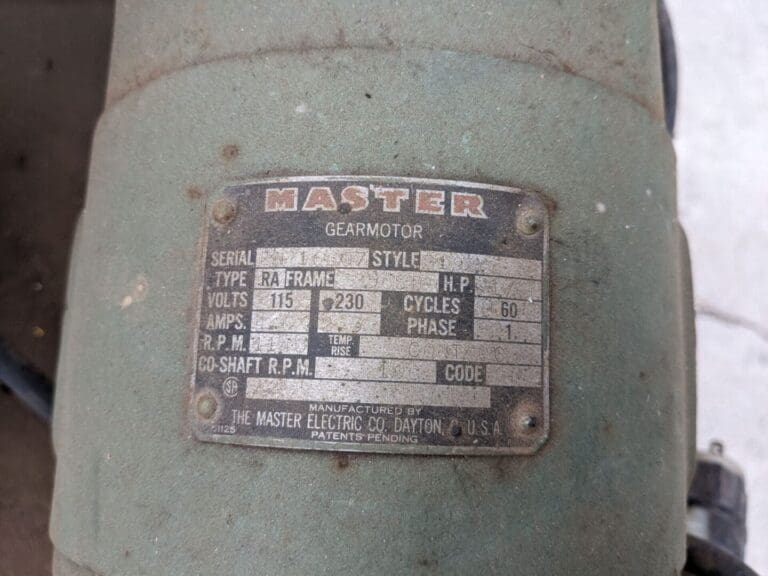 A close up of the label on an old machine