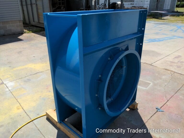 A blue metal box sitting on top of a wooden crate.