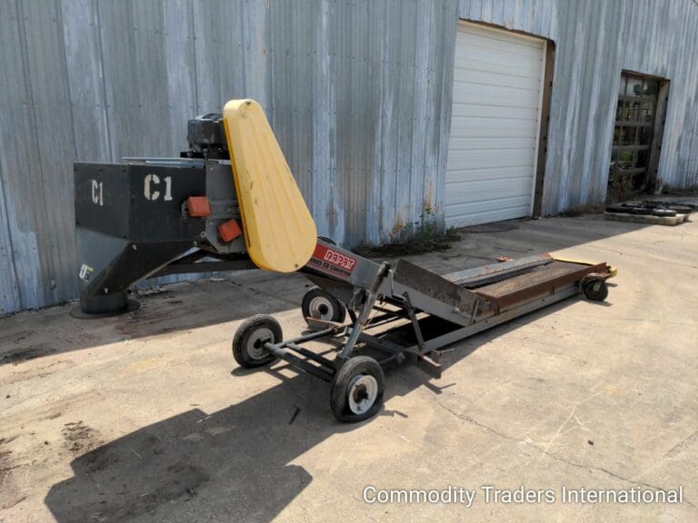 A yellow seat on top of a cart.