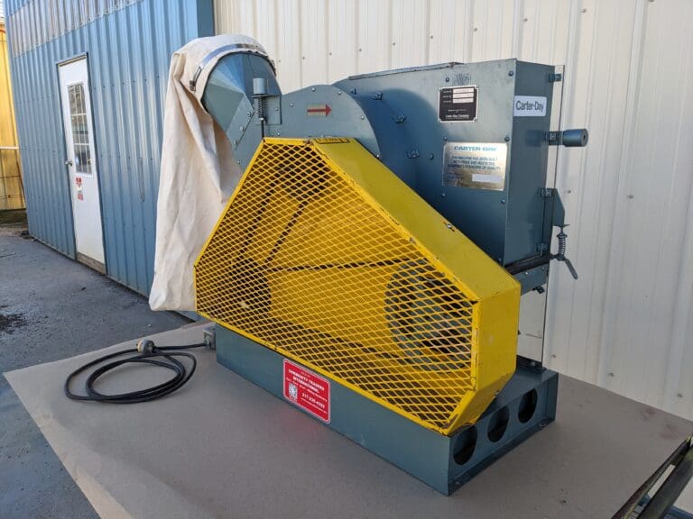 A yellow fan is sitting on the floor