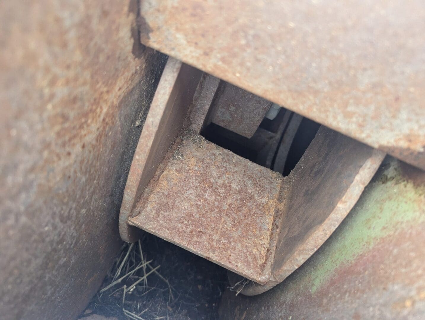 A close up of the bottom of an open door.