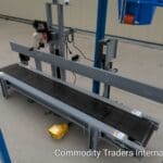 A bench with two metal rails on it.