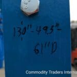 A blue sign with the price of a building