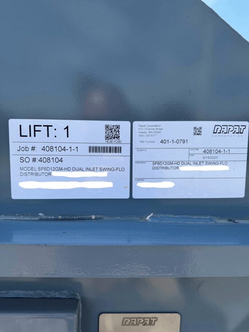 A close up of two stickers on the side of a car