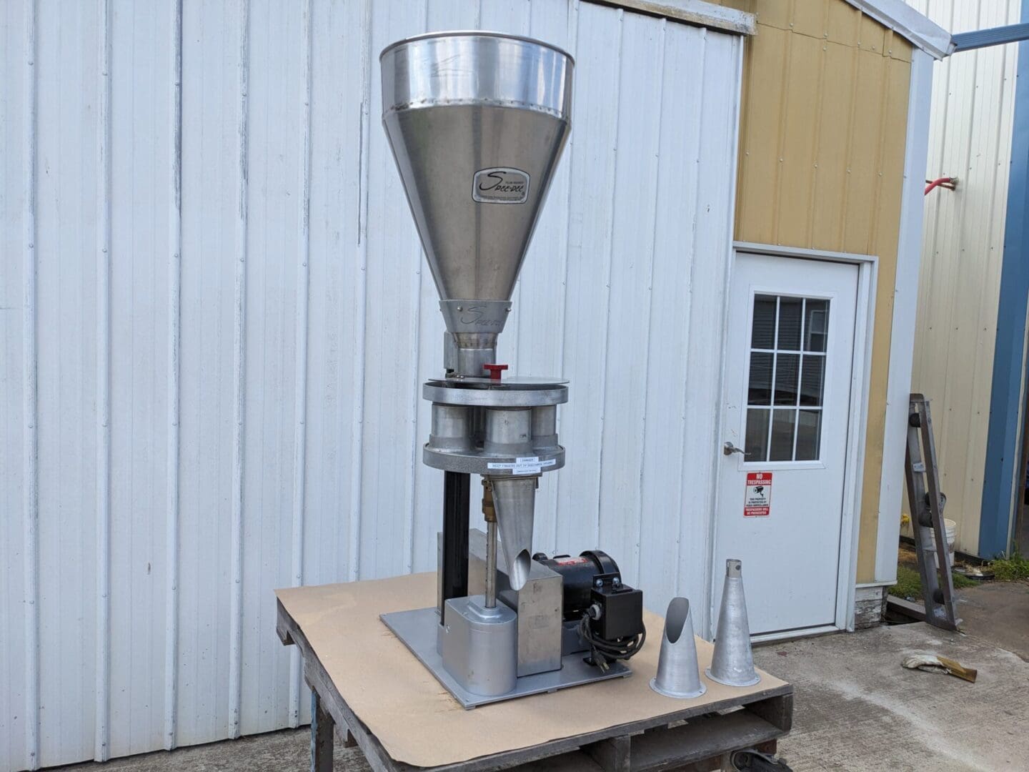A table with some small machines on it