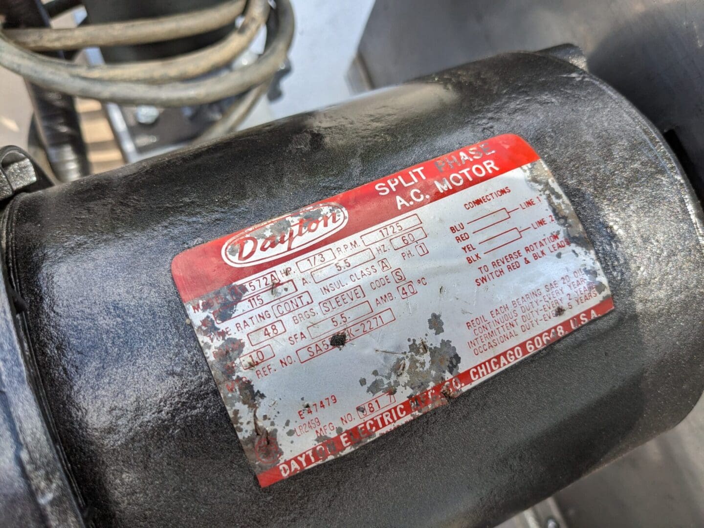 A close up of the label on an old motor