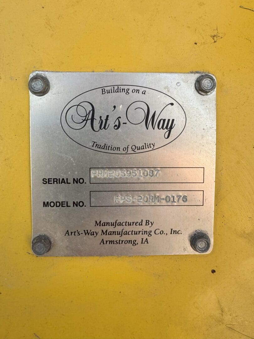 A metal plate with the words " building on a art 's way " written in it.