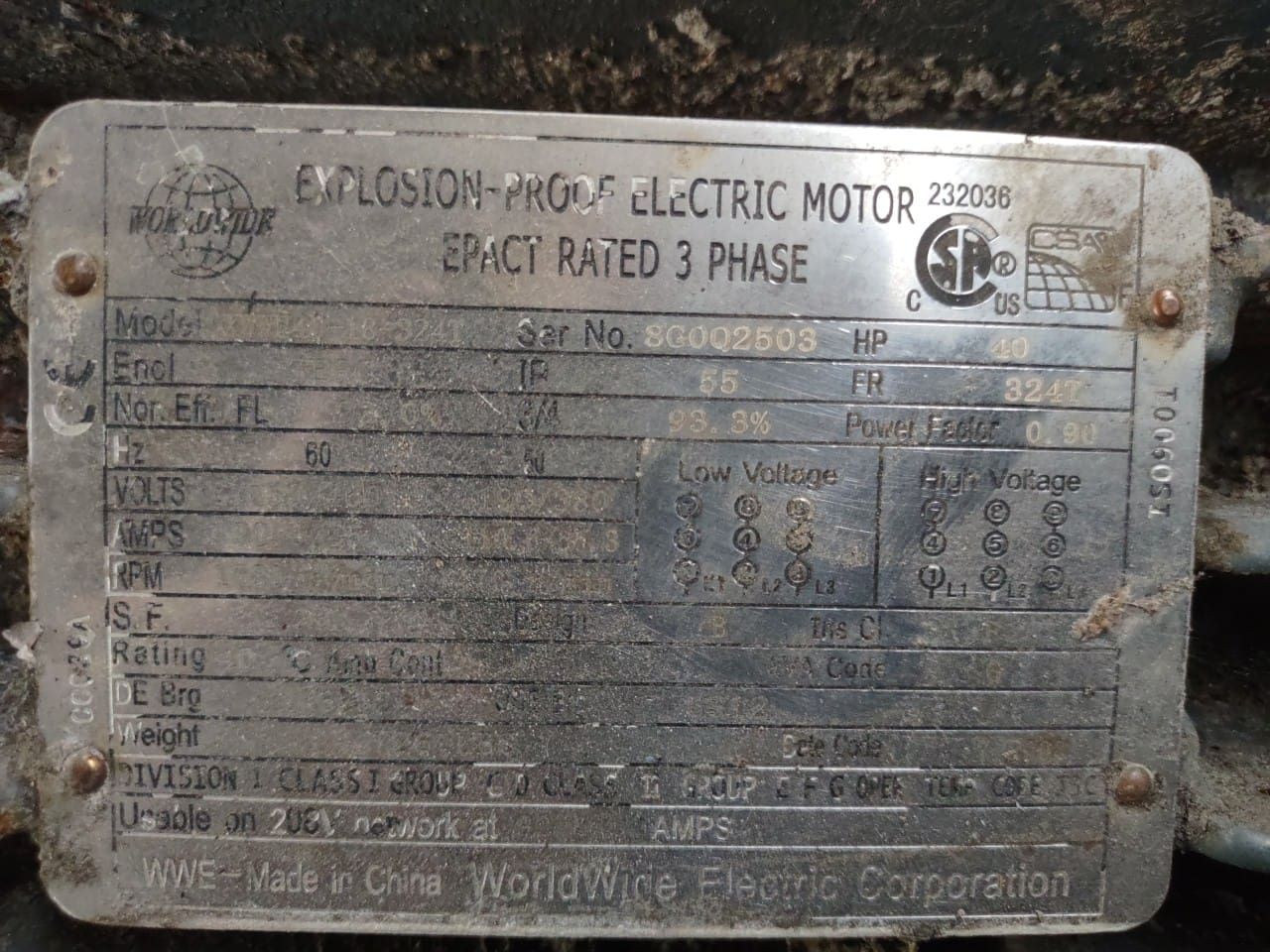 A metal plate with some writing on it