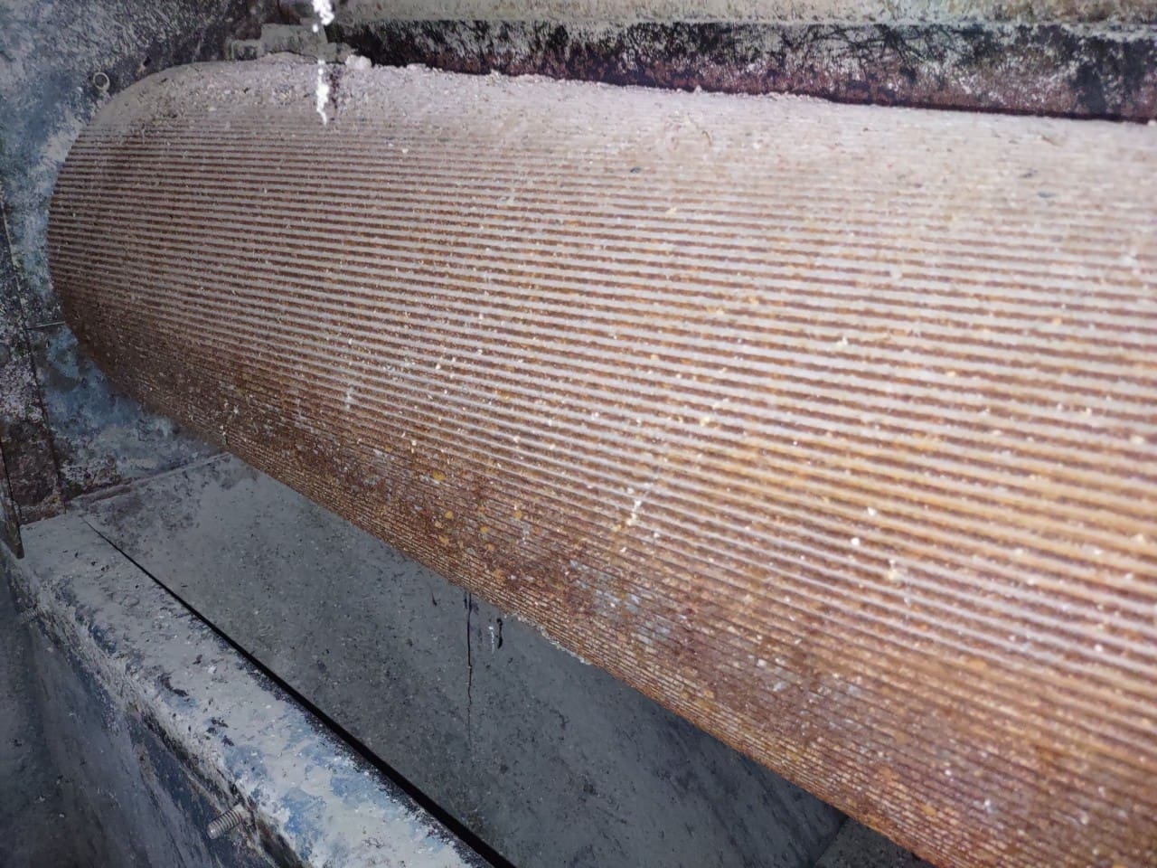 A close up of the bottom of a wooden bench