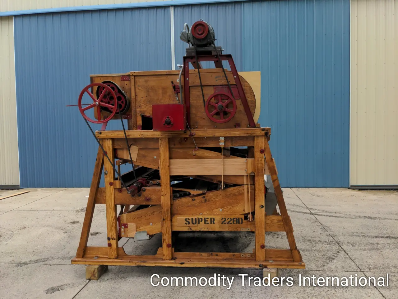 A wooden crate with some machinery on top of it