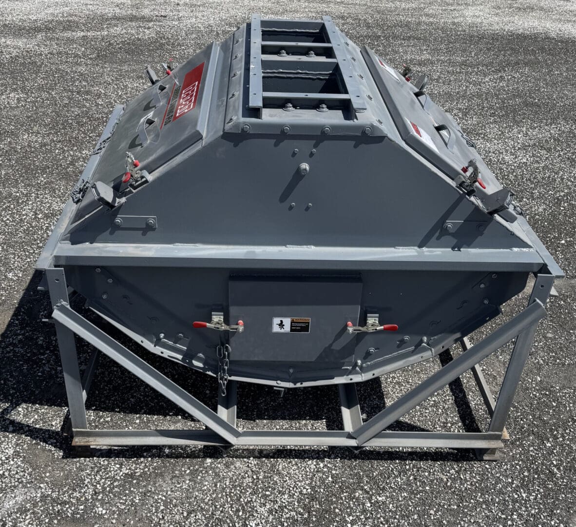 A large metal structure with a black top.