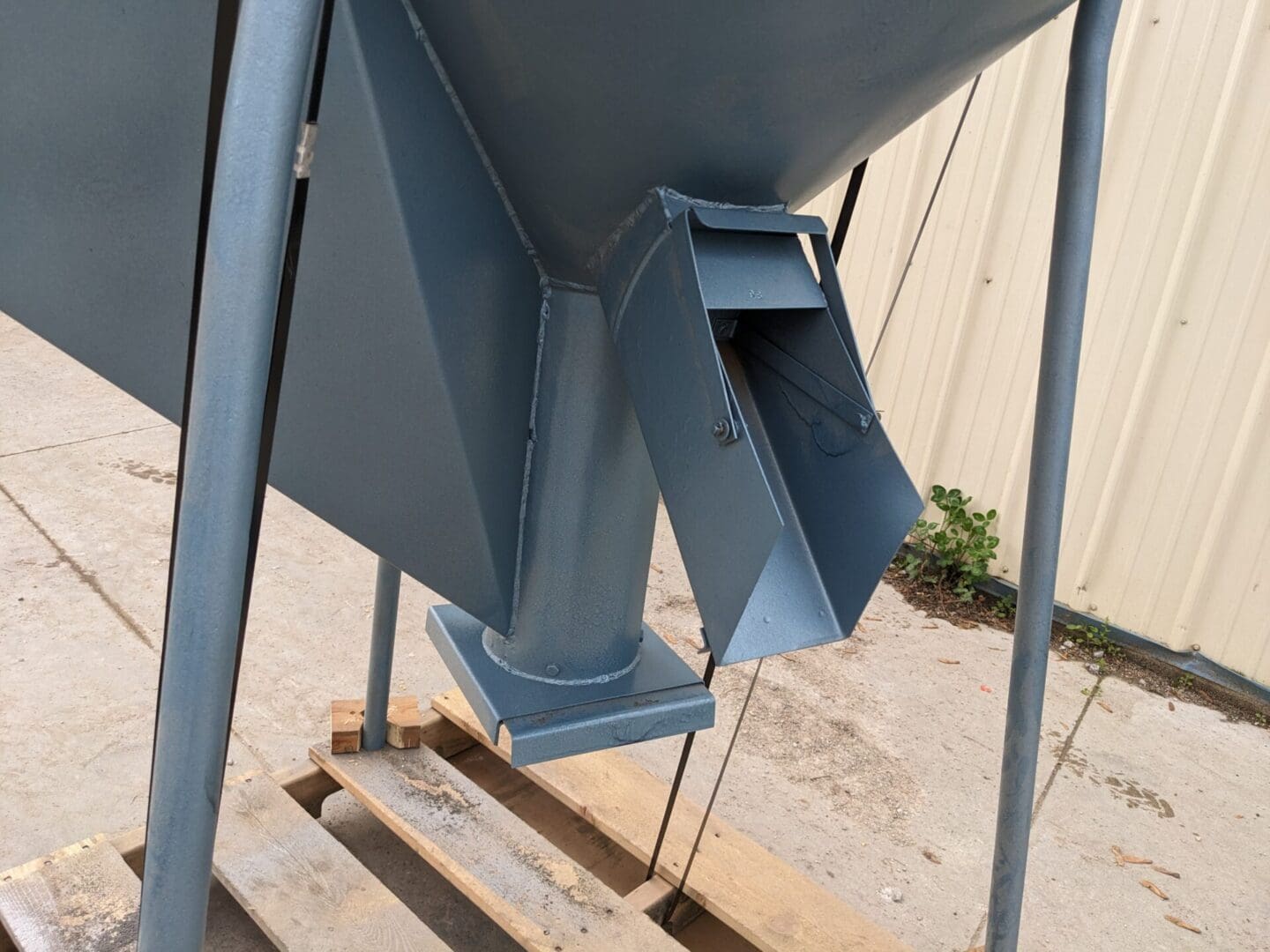 A close up of the side of a cement mixer.