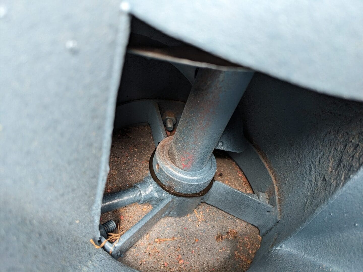 A close up of the bottom of an exhaust pipe