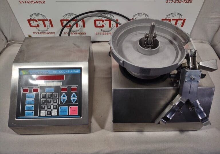 A table with some electronic equipment on it